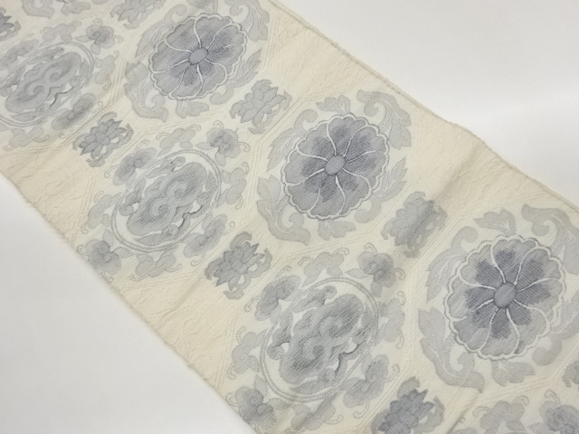 蜀江文に菊唐草・抽象花葉模様織出し名古屋帯